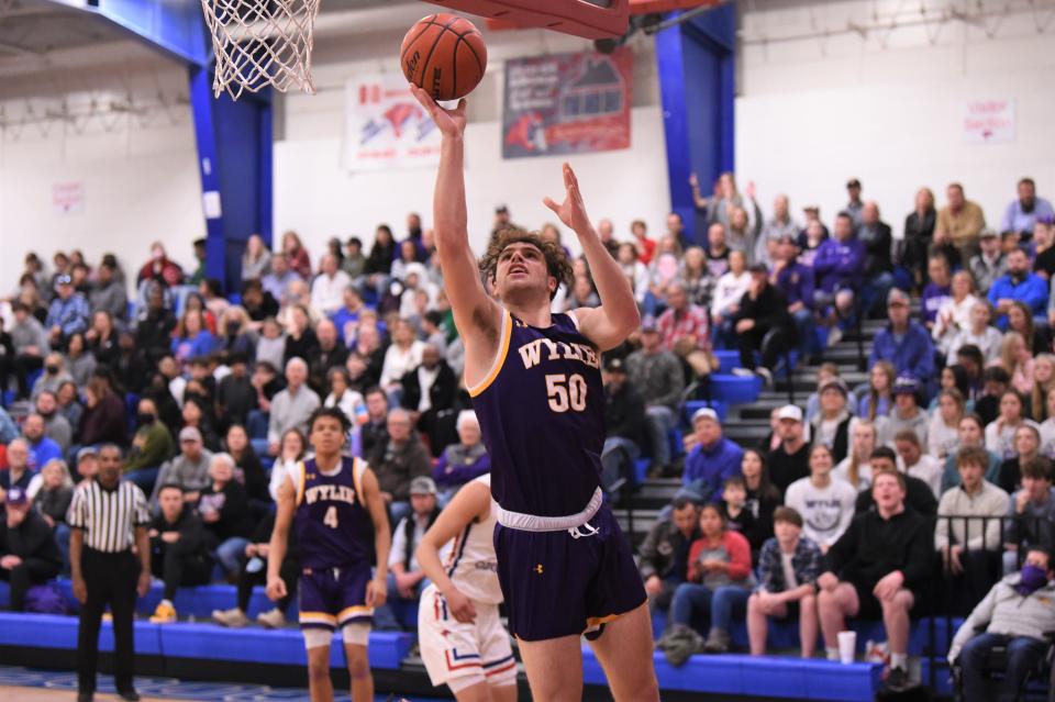 Wylie's Avery Brekke (50) goes up for a shot during Friday's Southtown Showdown against Cooper at Cougar Gym on Jan. 21, 2022. The Bulldogs kept the game close before falling 54-41.