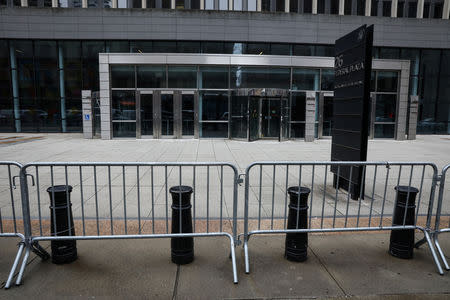 Temporary fences are placed outside the public entrance to 26 Federal Plaza, a U.S. government office building, during the partial U.S. government shutdown in New York