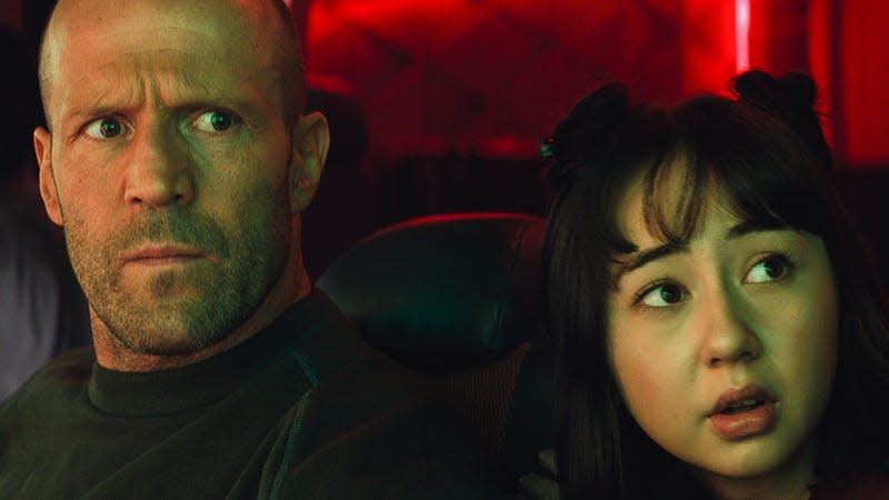 Statham and Cai in a very representative image from the film.