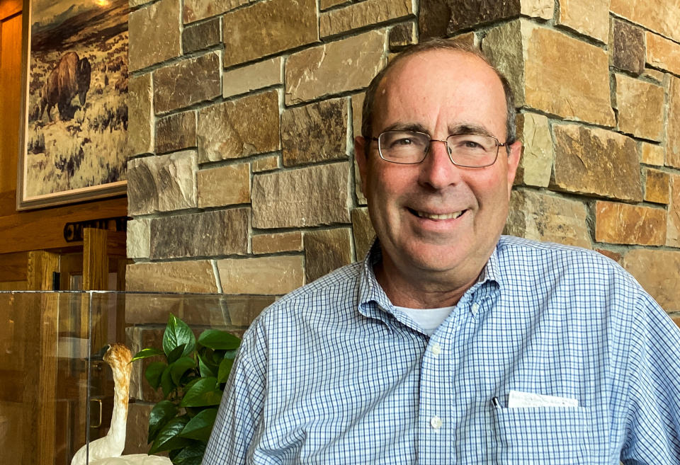 FILE PHOTO: Federal Reserve Bank of Richmond President Thomas Barkin poses in the lobby of Jackson Lake Lodge in Jackson Hole, where the Kansas City Fed holds its annual economic symposium, in Wyoming, U.S., August 24, 2023. REUTERS/Ann Saphir/File Photo