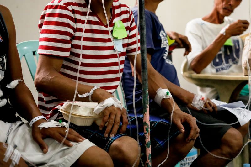 Patients poisoned after drinking coconut wine are treated at an emergency ward in Philippine General Hospital in Manila