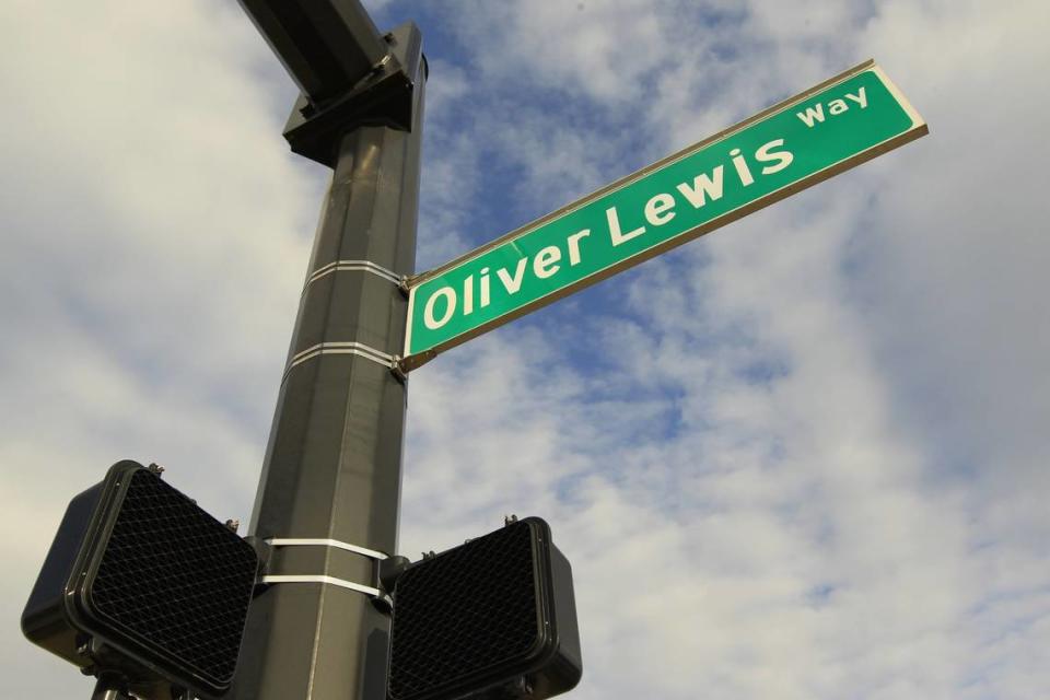 A sign for the Oliver Lewis Way overpass in Lexington. It is named for the jockey, a Fayette County native, who won the first Kentucky Derby aboard Aristides. Pablo Alcala/Herald-Leader File Photo