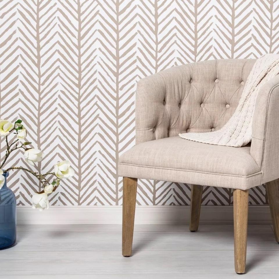 Beige and white herringbone pattern peel-and-stick wallpaper