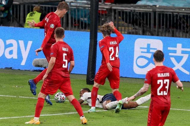 The penalty was awarded with Joakim Maehle adjudged to have fouled Sterling (Catherine Ivill/PA).