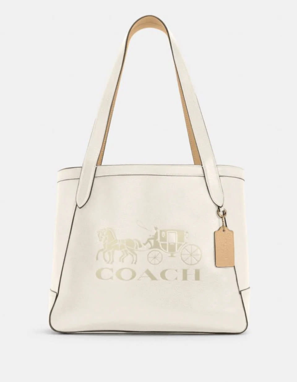 Bolso Horse And Carriage en color crema (Foto de Coach Outlet).