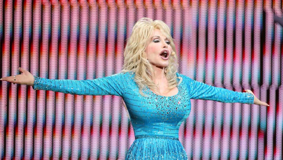 BOURNEMOUTH, UNITED KINGDOM - SEPTEMBER 06: Dolly Parton performs at Bournemouth International Centre on September 6, 2011 in Bournemouth, England. (Photo by Harry Herd/WireImage)