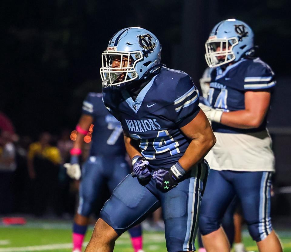 Central Valley running back Jance Henry (24) celebrates after a touchdown during the second half against Montour Friday night at Central Valley High School.