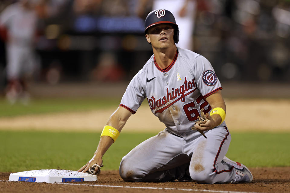 Washington Nationals' Alex Call reacts afetr being picked off by New York Mets pitcher David Peterson during the fifth inning of a baseball game Friday, Sept. 2, 2022, in New York. (AP Photo/Adam Hunger)
