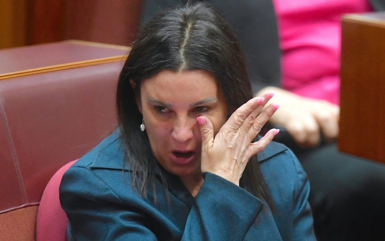 Jacqui Lambie delivers a statement regarding her resignation in the Senate chamber at Parliament House in Canberra - REUTERS