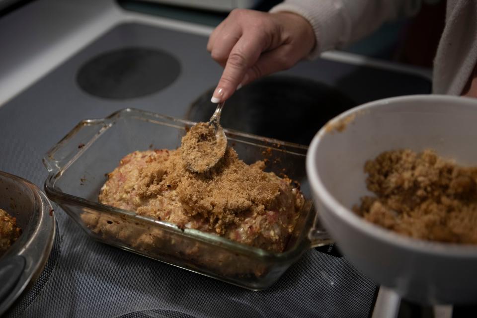 Stacey Rauch prepares her "Ham Loaf" in her kitchen at her home on December 7, 2022 in Lancaster, Ohio.
(Photo: Ty Wright/Eagle Gazette)