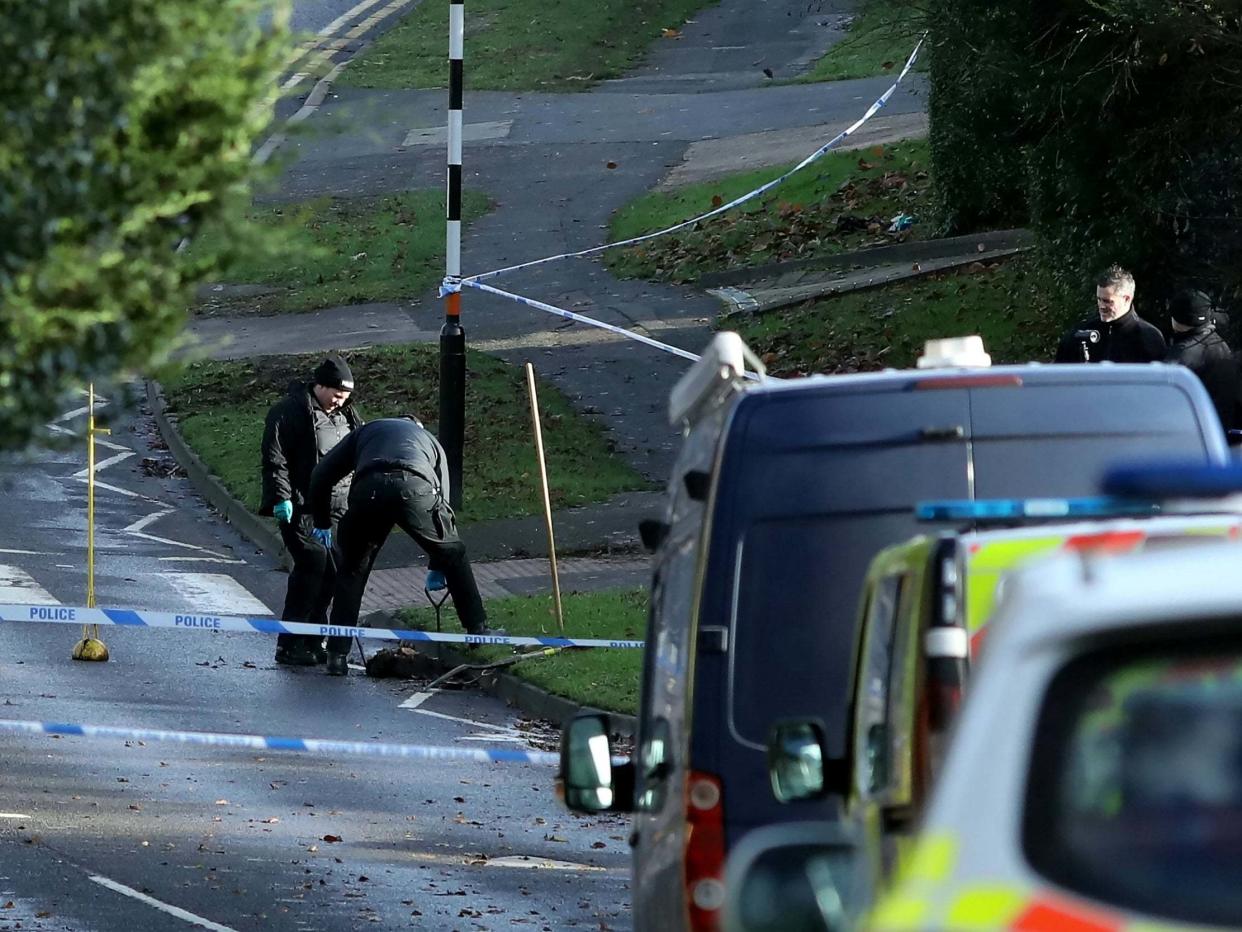 Police hunt for clues in the road where a 25-year-old woman was stabbed to death: Northamptonshire Telegraph /SWNS