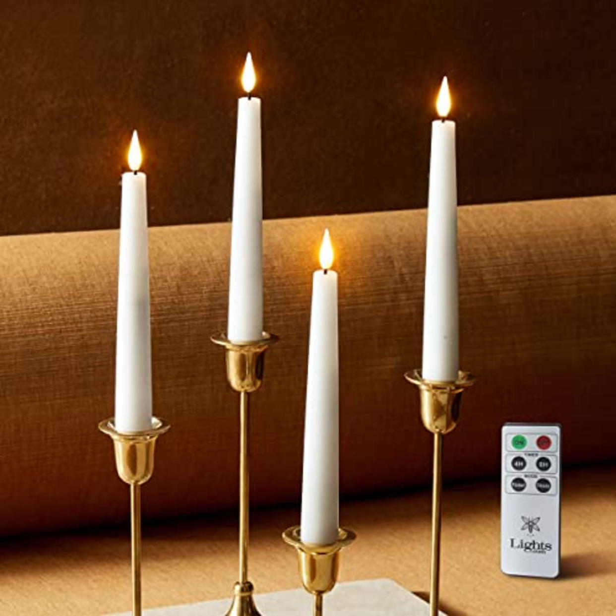 LampLust 7 Inch Flameless Taper Candles - Realistic 3D Flame with Wick, White Real Wax, Flickering Flameless Candle LED, Home Decor, Automatic Timer, Remote Control and Batteries Included - Set of 4 (AMAZON)