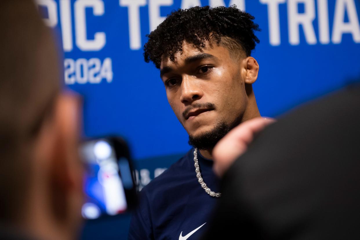 Carter Starocci talks with a group of reporters during the U.S. Olympic Team Trials at the Bryce Jordan Center April 20, 2024, in State College.