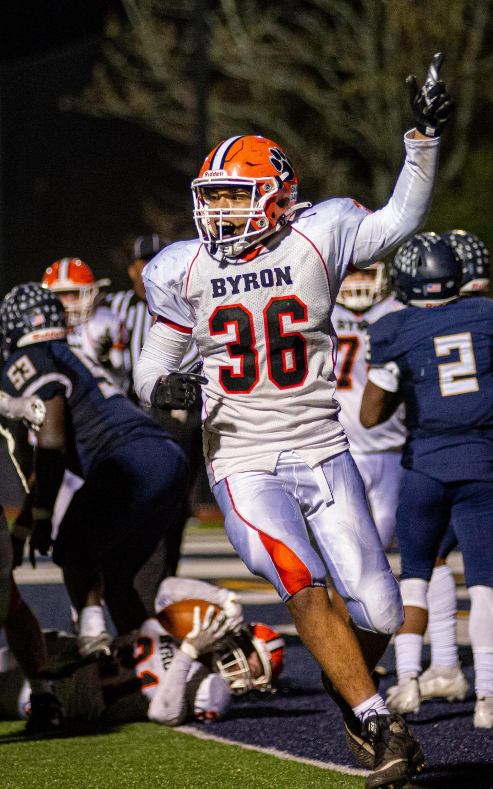 Byron tight end Isiah Gooden celebrates after Chandler Binkley pushes over the goal line during the fourth quarter of the state semifinal game in Elmhurst on Saturday, Nov. 20, 2021. Byron beat IC Catholic 15-14 in the final 5 seconds of the game.