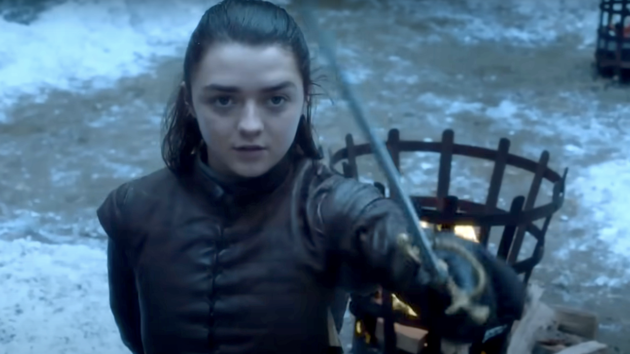  Maisie williams as arya stark with her sword on game of thrones. 