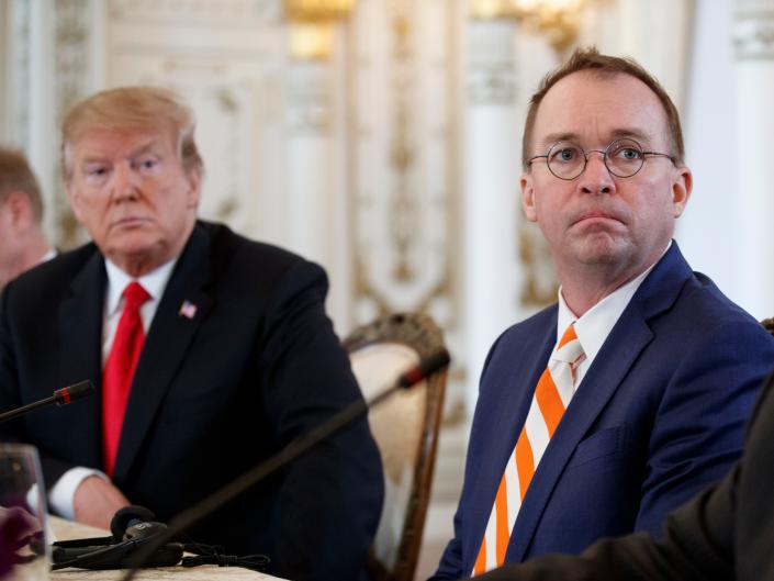 From left, President Donald Trump and acting White House chief of staff Mick Mulvaney, and Deputy Secretary of State John Sullivan, sit together during a meeting with Caribbean leaders at Mar-A Lago, Friday, March 22, 2019, in Palm Beach, Fla.