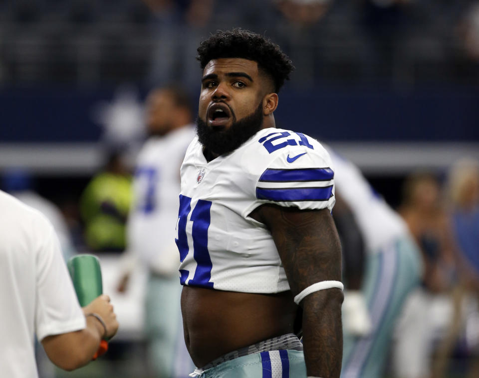 Ezekiel Elliott remains suspended for six games for violating the NFL's domestic violence policy. (AP) 