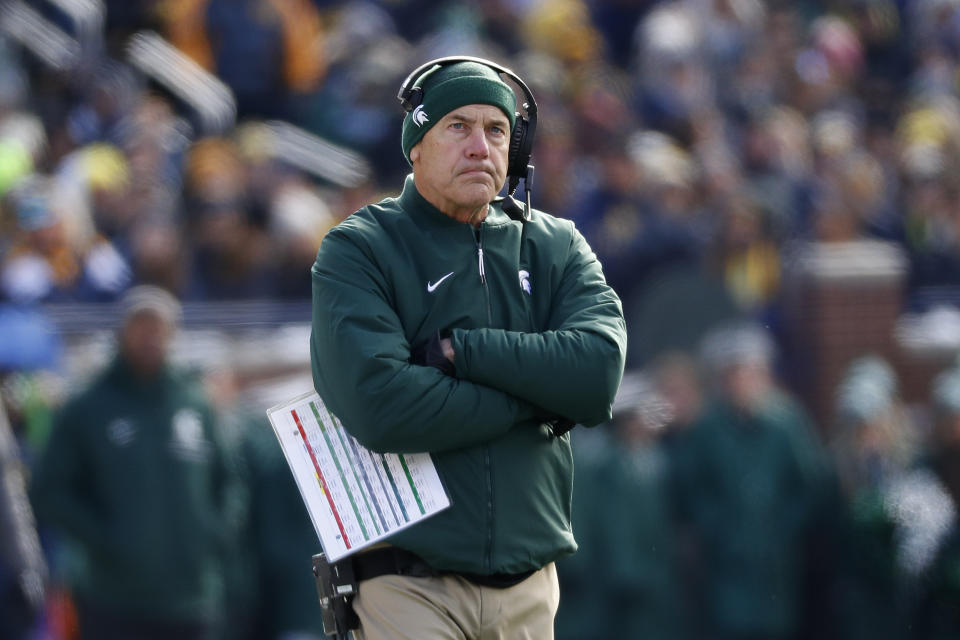 Michigan State head coach Mark Dantonio watches against Michigan in the first half of an NCAA college football game in Ann Arbor, Mich., Saturday, Nov. 16, 2019. (AP Photo/Paul Sancya)