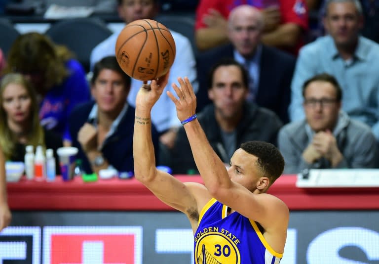 Steph Curry of the Golden State Warriors shoots for three against the Los Angeles Clippers during their NBA game in Los Angeles, California on November 19, 2015