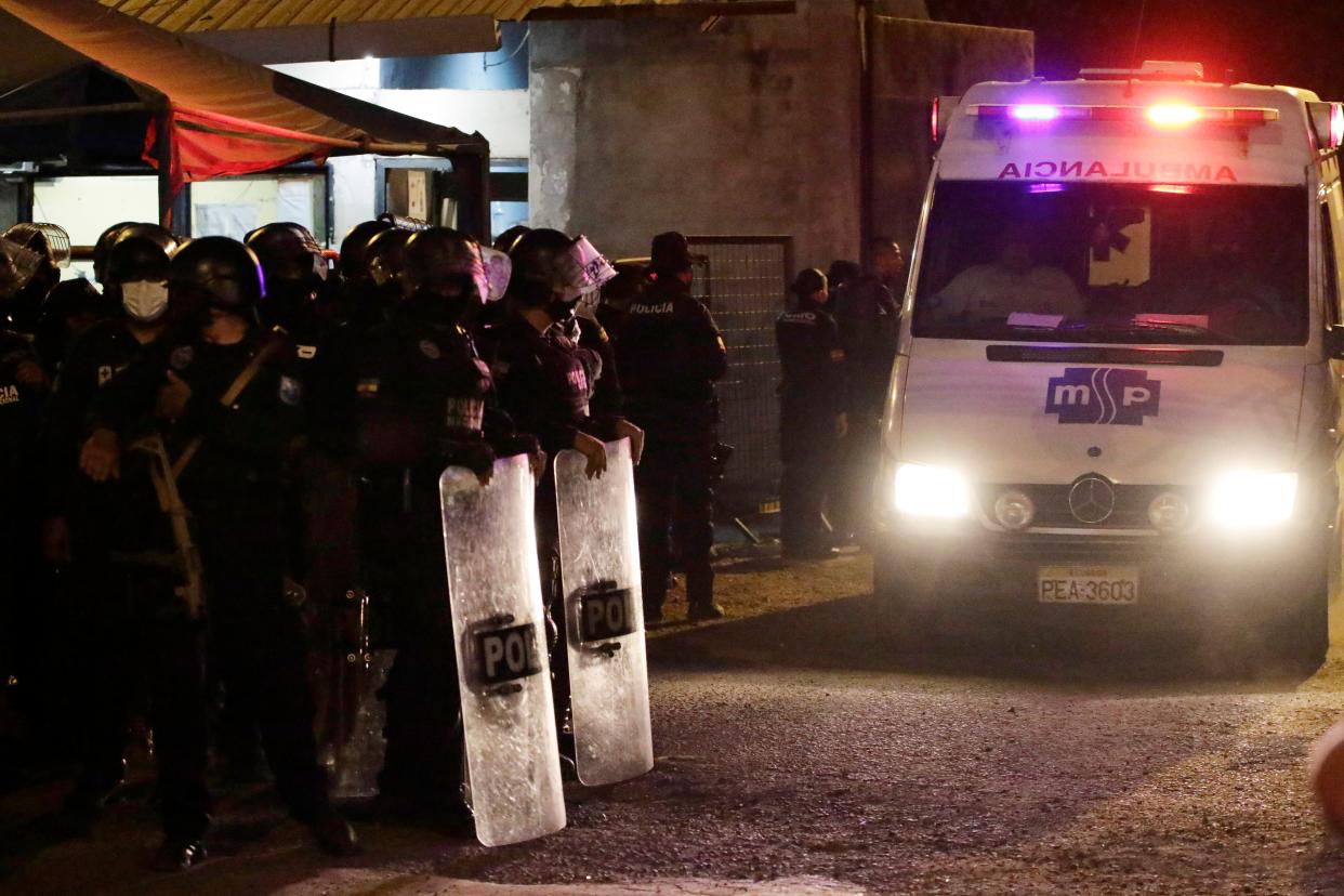 An ambulance leaves the Litoral Penitentiary after a riot in Guayaquil, Ecuador, on Tuesday (AP)