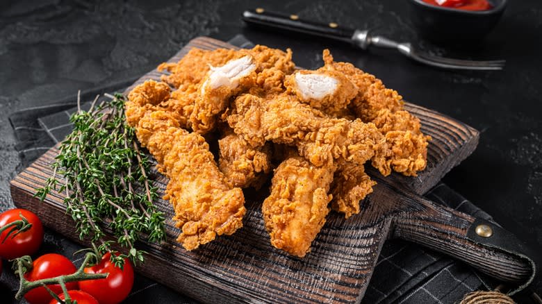fried chicken on cutting board