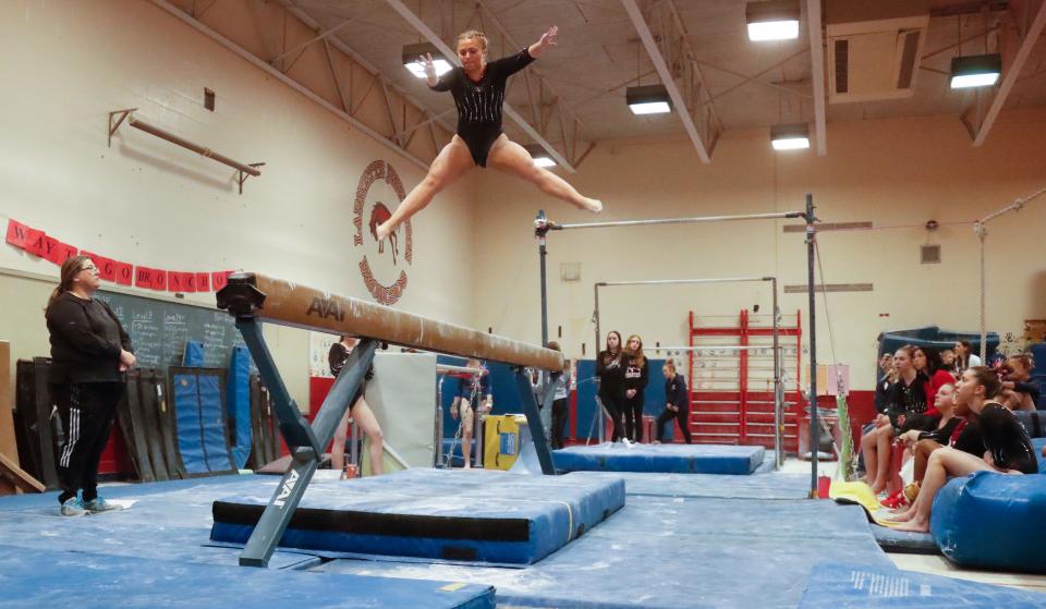 Lafayette Jeff Katie Graves competes in the beam during the IHSAA gymnastics invitational, Wednesday, Jan. 17, 2024, at Linnwood Elementary School in Lafayette, Ind.
