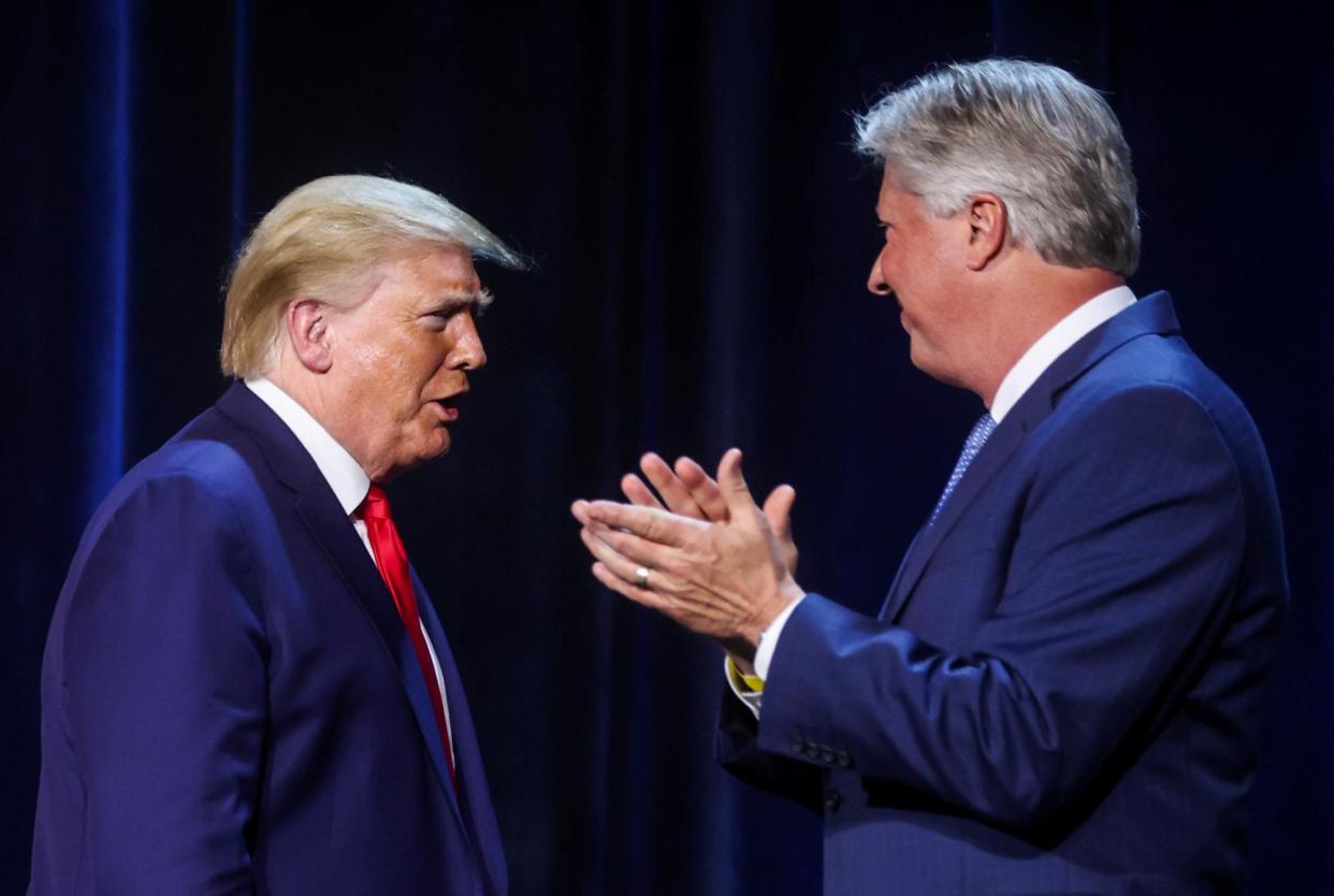 <span>Donald Trump is greeted by Pastor Robert Morris at an event in Dallas, Texas, on 11 June 2020.</span><span>Photograph: Jonathan Ernst/Reuters</span>