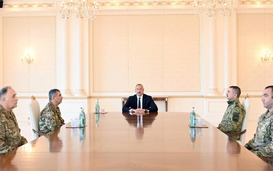 Azerbaijan President Ilham Aliyev meets with the military leadership in Baku - AFP