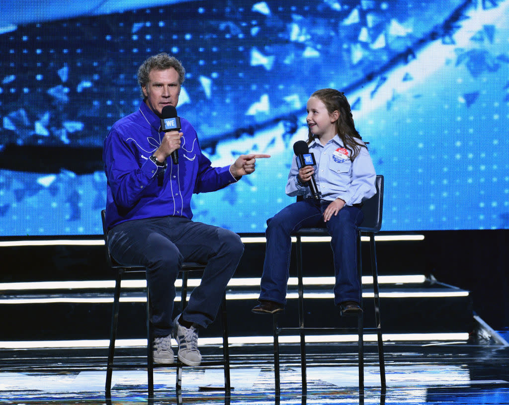 Will Ferrell jokes with presidential expert Macey Hensley at WE Day on April 19, 2018, in Inglewood, Calif. (Photo: Allen Berezovsky/FilmMagic)