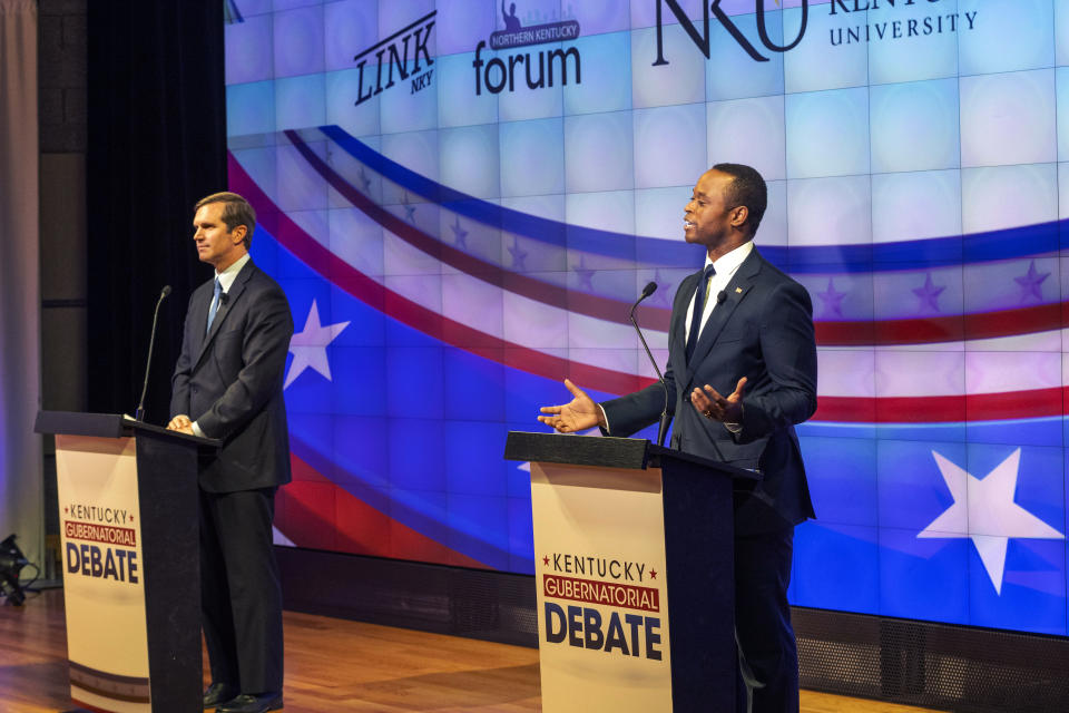 Republican Attorney General Daniel Cameron, right, speaks during a gubernatorial debate against Democratic Gov. Andy Beshear, left, at Northern Kentucky University, in Highland Heights, Ky., Monday, Oct. 16, 2023. (Joe Simon/LINK nky via AP, Pool)
