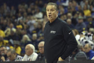 Kentucky Wildcats' head coach John Calipari during an NCAA basketball game between Michigan Wolverines and Kentucky Wildcats at the O2 Arena, in London, Sunday, Dec.4, 2022. (AP Photo/Ian Walton)