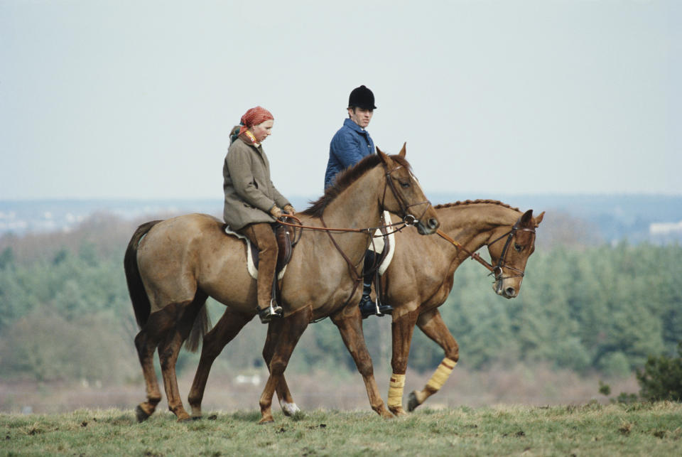 Princess Anne, the Princess Royal, and her husband Mark Phillips out exercising their horses at the Crookham Horse Trials, circa 1980. (Photo by Tim Graham Photo Library via Getty Images)