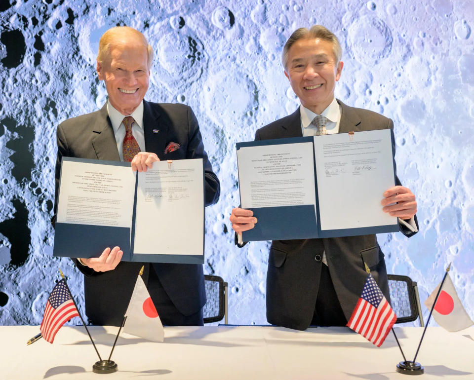 NASA Administrator Bill Nelson and Masahito Moriyama, Japan’s minister of education, culture, sports, science and technology, hold signed copies of an agreement between the United States and Japan to cooperate on future crewed moon missions.