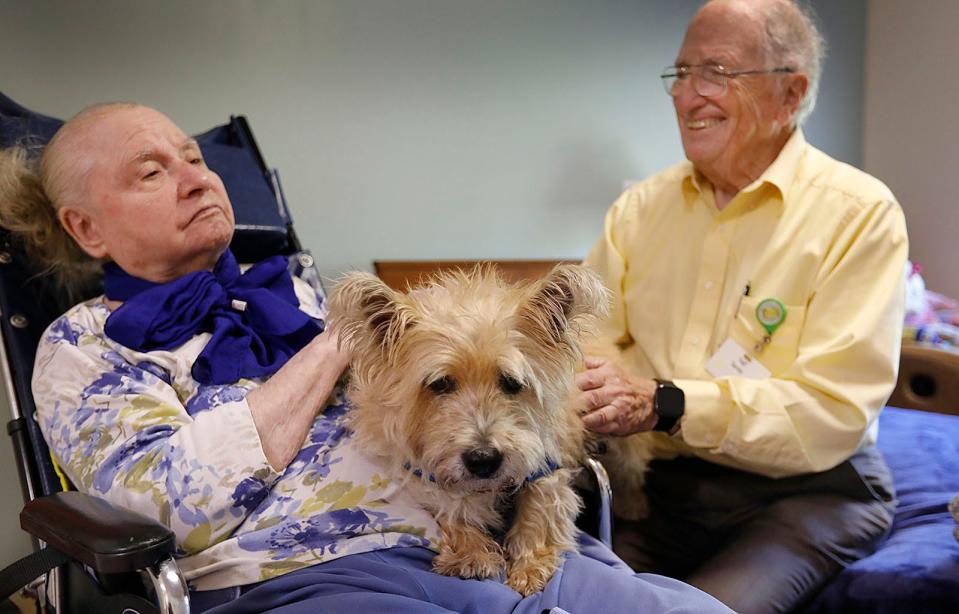 Ted Sandy, 94, and his adopted cairn terrier, Bruno, visit Ted's wife, Carol, at Linden Ponds' Rose Court. Ted also lives at Linden Ponds. Thursday, Oct. 6, 2022.