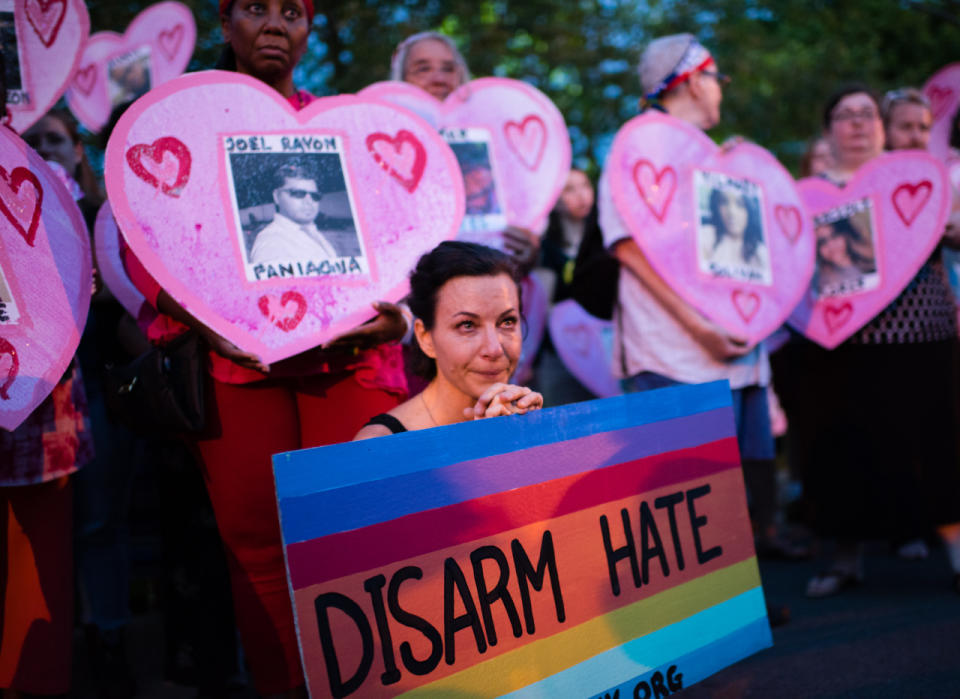 A diverse coalition of groups and activists held an overnight peace vigil in front of the National Rifle Assiciation's (NRA) offices in Fairfax, VA to honor the 49 people killed in the mass shooting in Orlando. They called for a ban on assault weapons. (Sarah L. Voisin/The Washington Post via Getty Images)