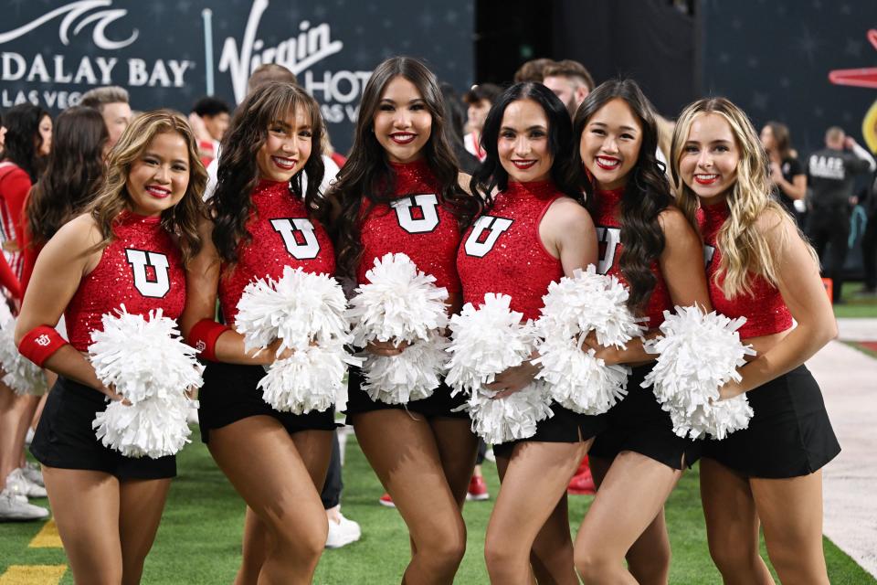 Utah Utes cheerleaders pose for photos as Utah and Northwestern prepare to play in the SRS Distribution Las Vegas Bowl on Saturday, Dec. 23, 2023. | Scott G Winterton, Deseret News