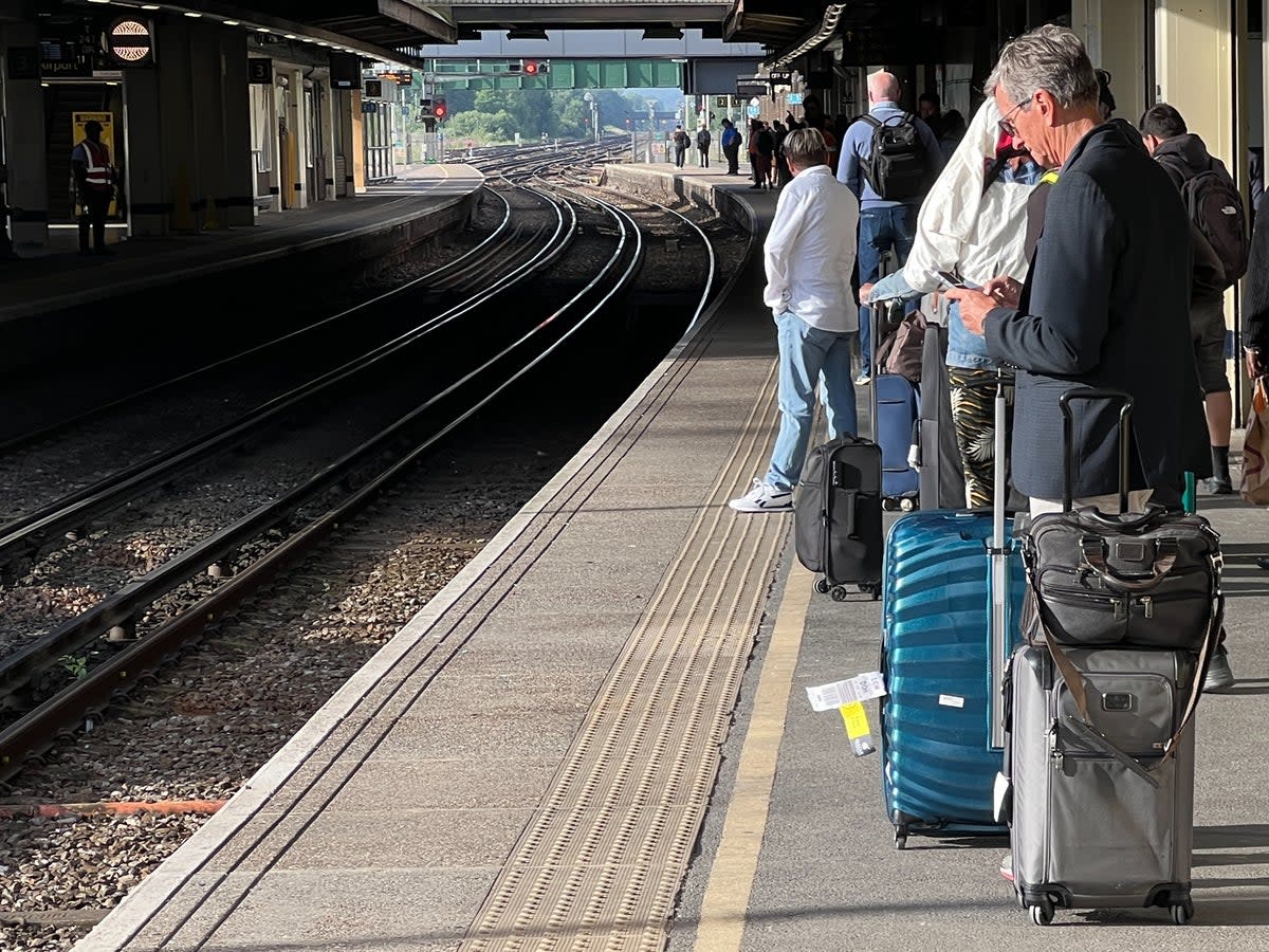 Waiting game: passengers at Gatwick airport station on the first day of the national rail strike in June 2022 (Simon Calder)