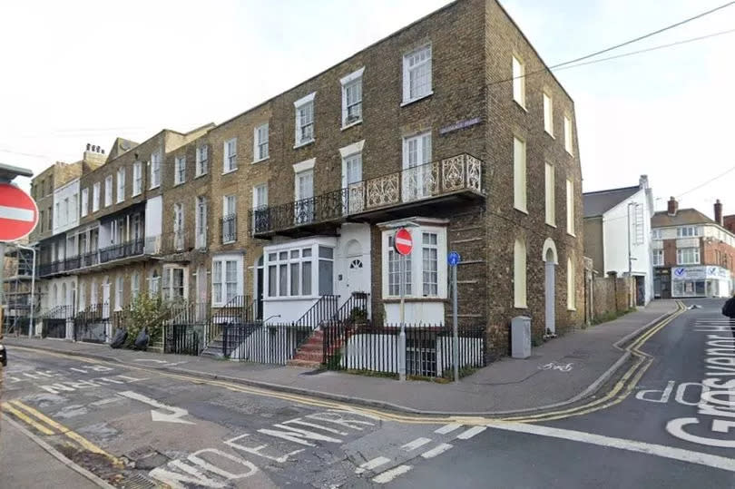 A long shot of Grosvenor Place with the property towards the middle of the terrace