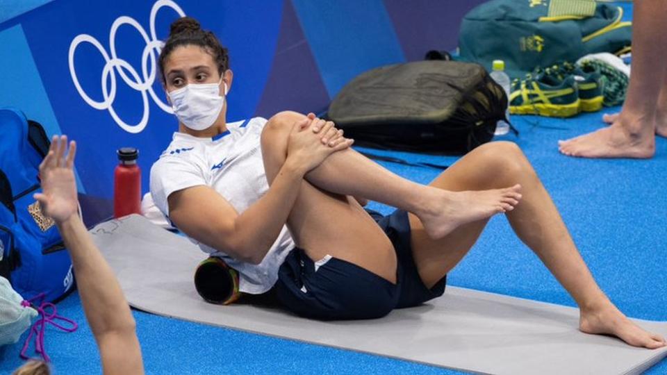 Andrea Murez stretching out before a swim in Tokyo