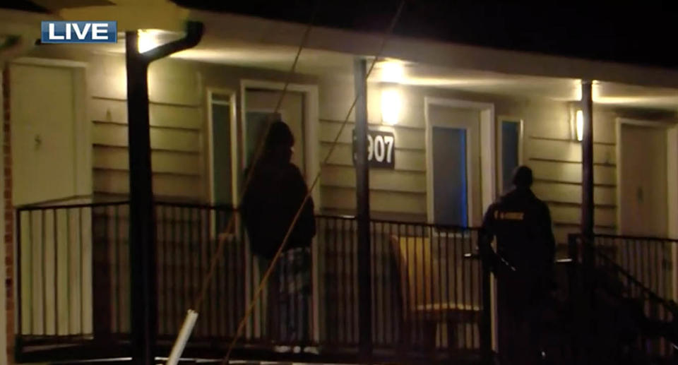 Police are seen outside of a Memphis apartment building where a baby was found.