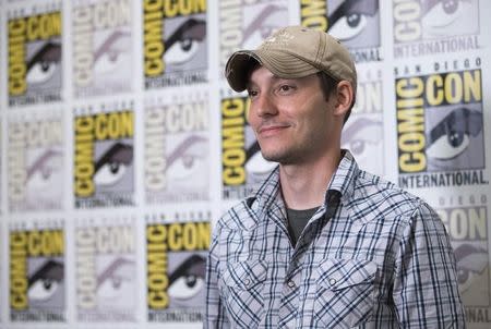 Director Wes Ball poses at a press line for "The Maze Runner" during the 2014 Comic-Con International Convention in San Diego, California July 25, 2014. REUTERS/Mario Anzuoni