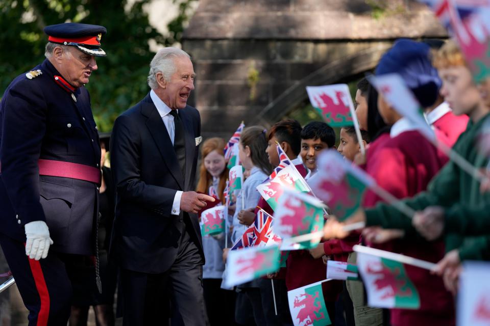 King Charles is able to speak Welsh as well as English (AP)