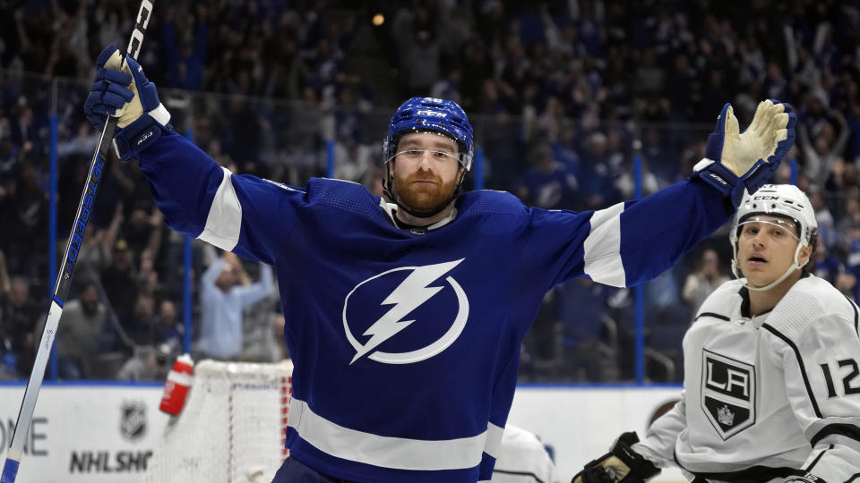 Tampa Bay Lightning defenseman Nick Perbix celebrates his game-winning goal in overtime during an NHL hockey game against the Los Angeles Kings Tuesday, Jan. 9, 2024, in Tampa, Fla. (AP Photo/Chris O'Meara)
