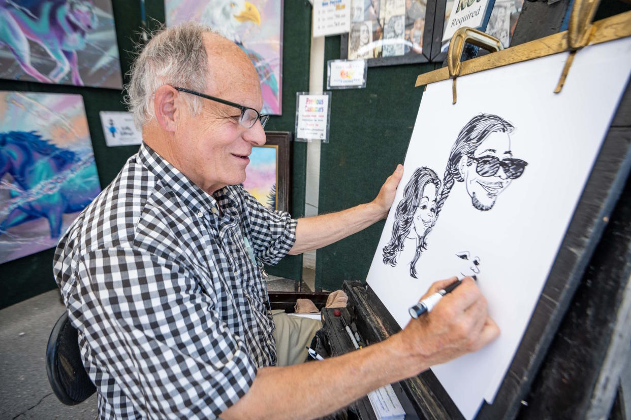 Kelly Killough, of Edmond, has been drawing caricatures at the Downtown Edmond Arts Festival for more than 15 years.