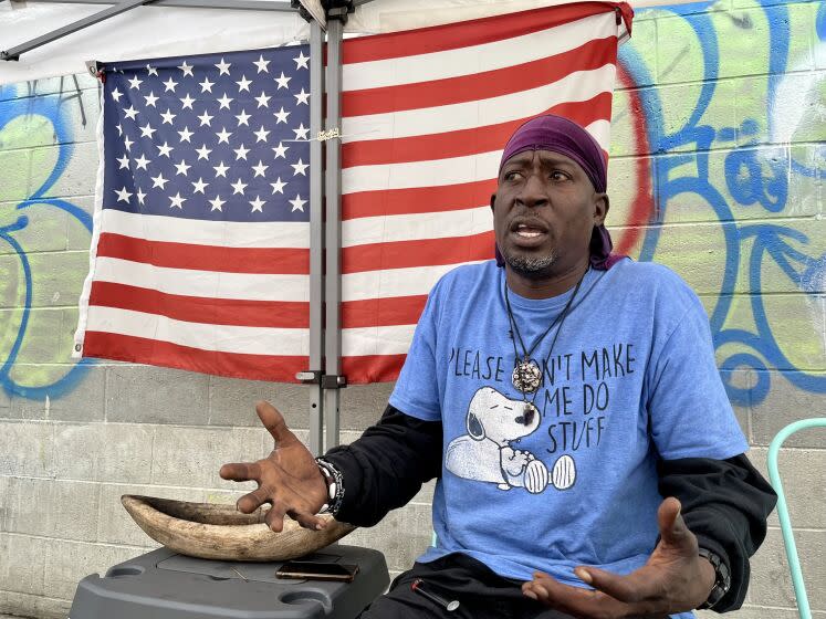 Quincy Arnaz Brown, who calls himself Pastor Blue, runs a safe-haven ministry on skid row.