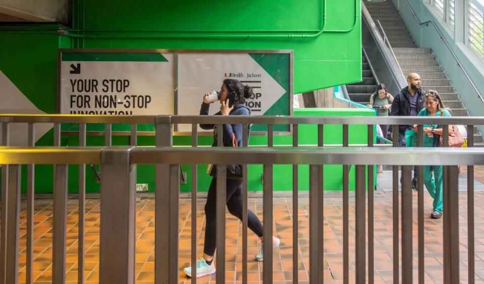 Metrorail riders arrive at the UHealth Jackson Metro Station, formerly known as the Civic Center, on Friday, July 12, 2024 in Miami, Fla.