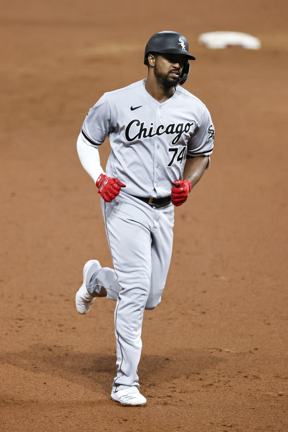 Chicago White Sox's Eloy Jimenez rounds the bases after hitting a two-run home run off Cleveland Indians pitcher Aaron Civale during the fifth inning of a baseball game, Monday, Sept. 21, 2020, in Cleveland. (AP Photo/Ron Schwane)