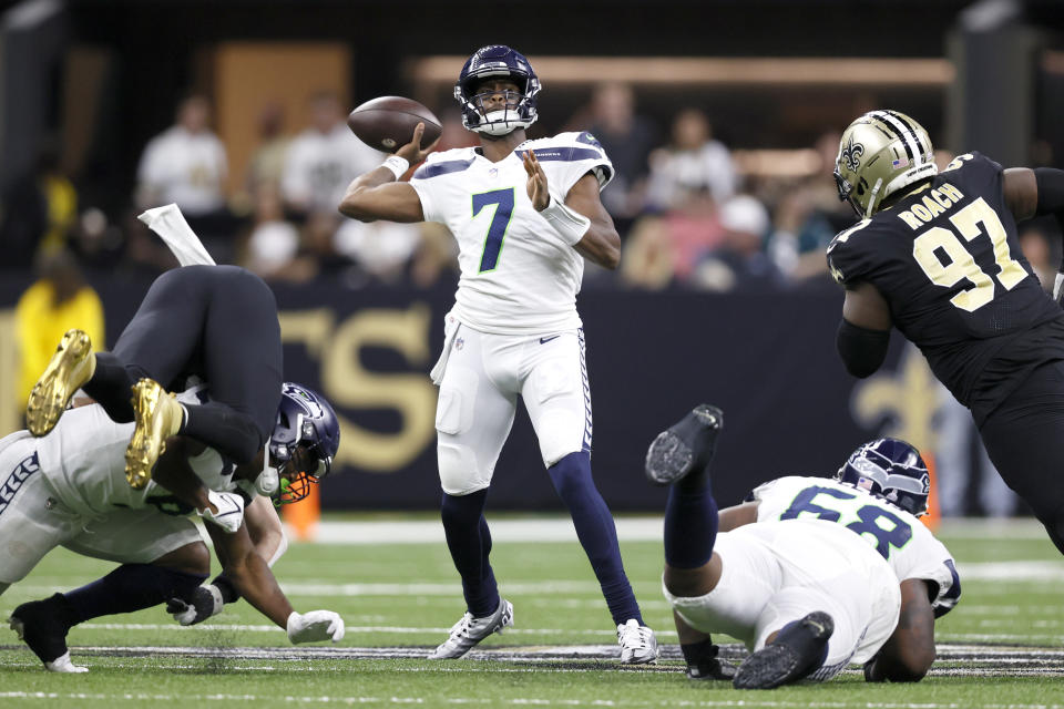 Seattle Seahawks quarterback Geno Smith passes during an NFL football game against the New Orleans Saints in New Orleans, Saturday, Oct. 8, 2022. (AP Photo/Derick Hingle)