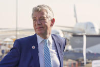 Paul Griffiths, the CEO of Dubai Airports, attends the Dubai Air Show in Dubai, United Arab Emirates, Monday, Nov. 15, 2021. Dubai International Airport, the world's busiest airport for international travel, handled some 20% more passenger traffic in the third quarter of 2021 compared to the same period last year, Griffiths said Monday, signaling cautious optimism for the ravaged aviation industry even as a full recovery may remain years off. (AP Photo/Jon Gambrell)