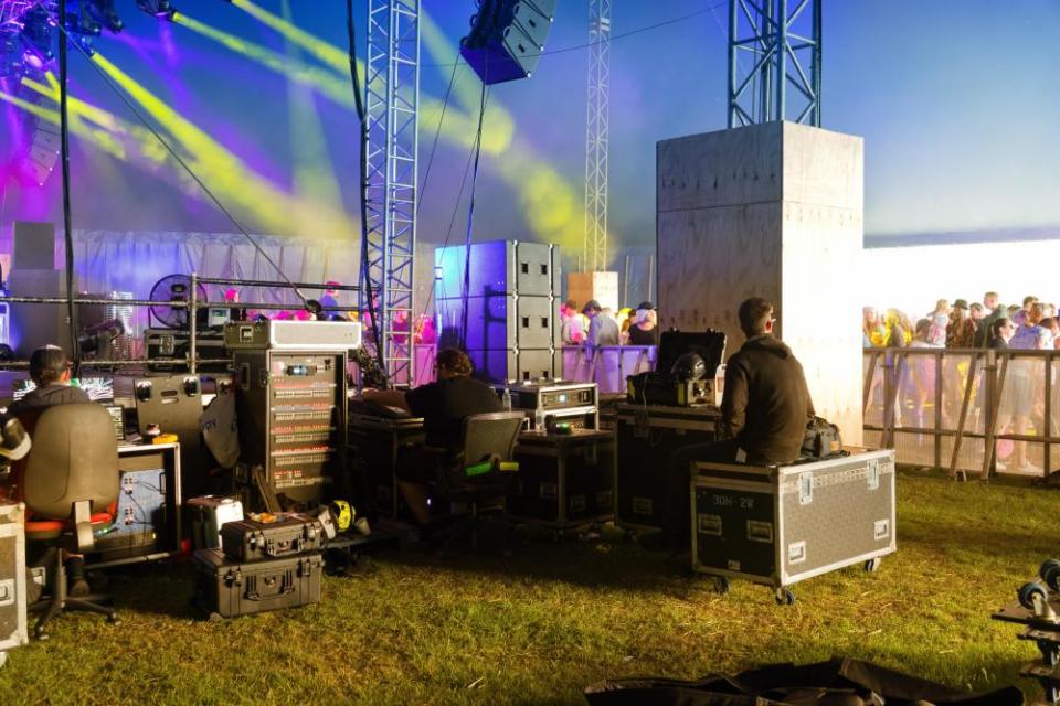 Backstage in a marque at a summer music festival